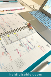 Planner next to laptop